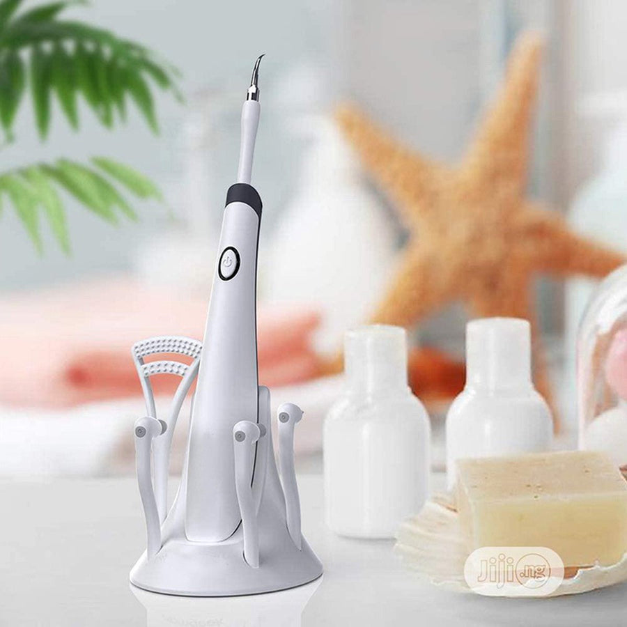 <tc>Ariko</tc> Ultrasonic tartar remover - extra attachments - 15,000 revolutions per minute - Including batteries